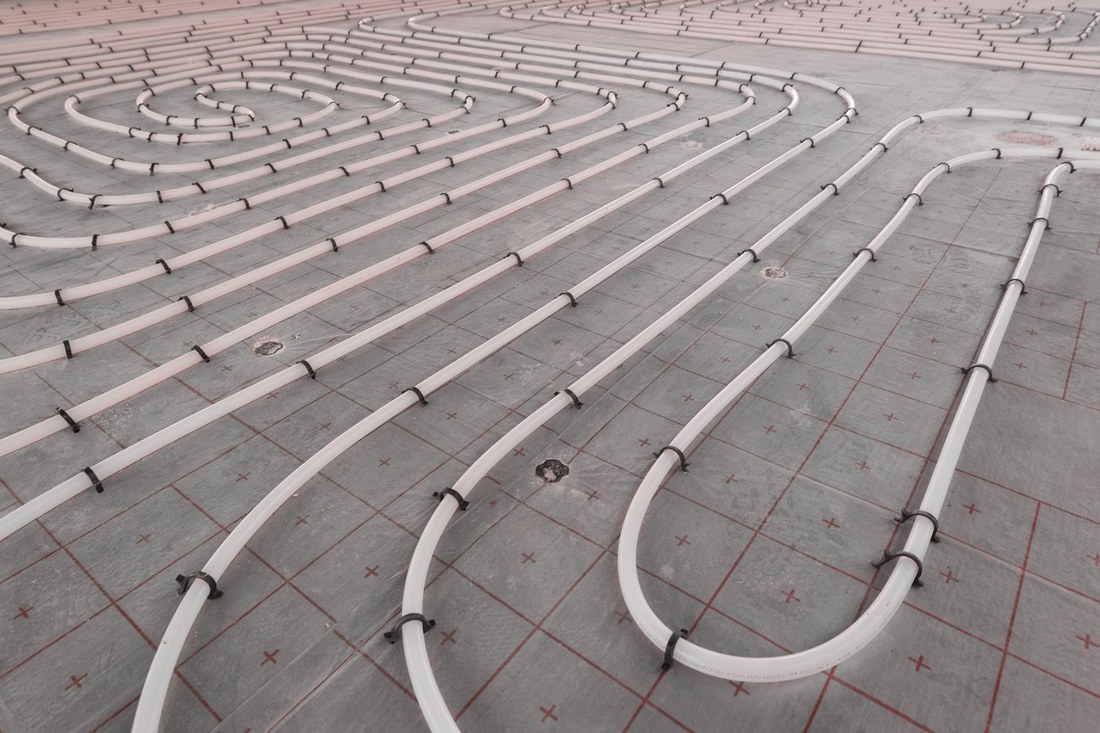 Radiant floor heating tubing laid before a pour