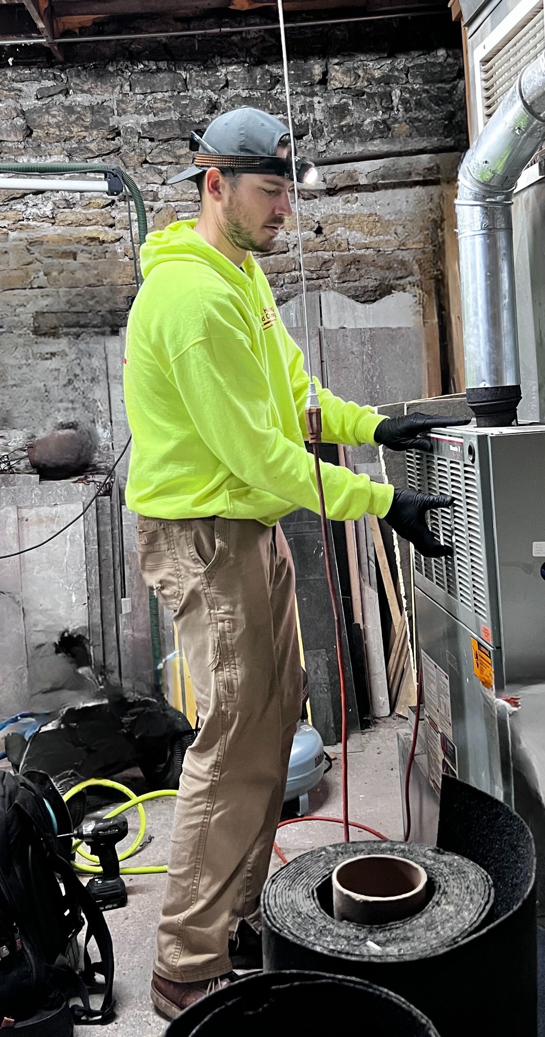 JC team member with HVAC equipment